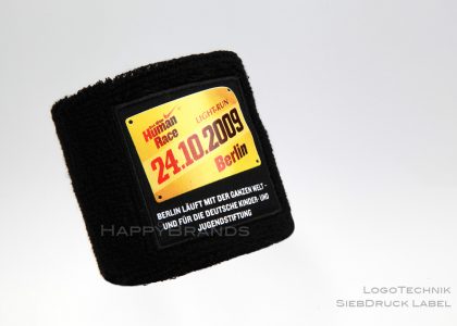 Handgelenkband-mit-eigenem-Logo-als-Siebdruck-Label
