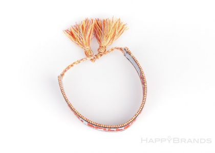 Bracciale in tessuto intrecciato in omaggio alla fiera in look Ibiza con logo ricamato come regalo aziendale
