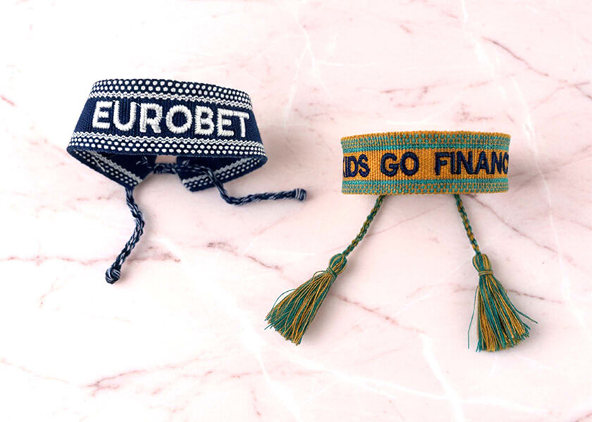 Gewebtes Armband mit Logo und Text als individuelles Giveaway für Promotion und Merchandise