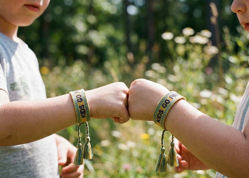 Gewebtes Armband mit Logo und Text als individuelles Giveaway für Promotion und Merchandise