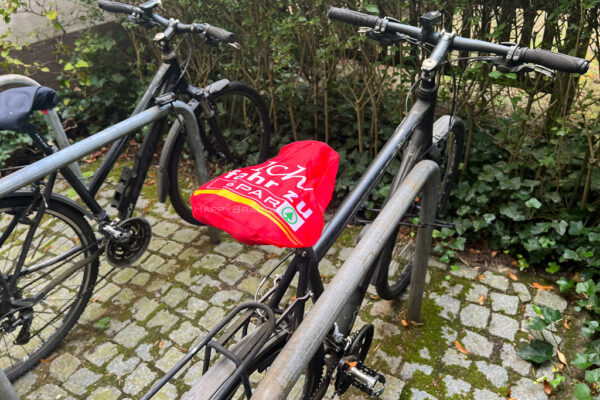 Werbegeschenk Fahrradsattel-Schutz mit Firmenlogo bedrucken Sattelbezug