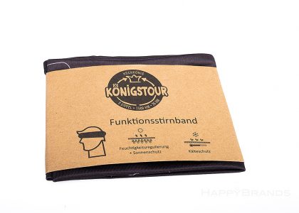 Company present running headbands made of RPET-in freely designable paper banderole made of recycled paper